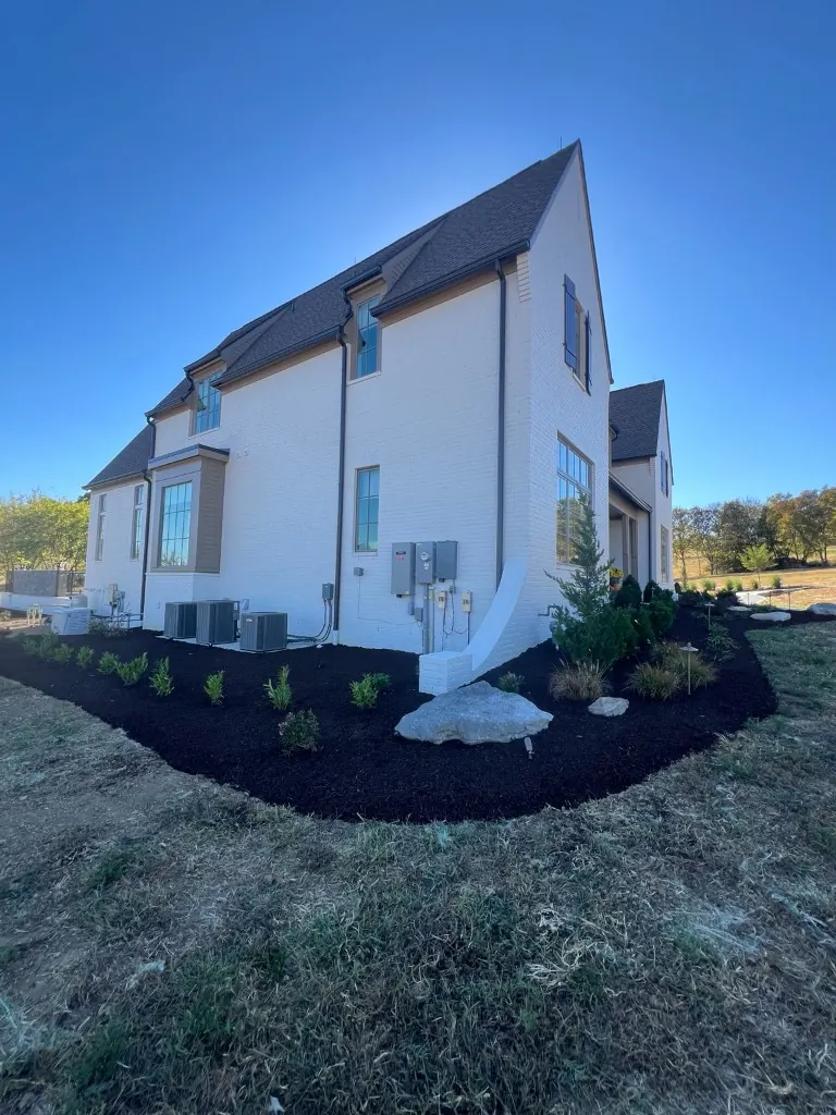 After landscape bed cleanup & brown mulch in College Grove, TN, MRX Landscaping