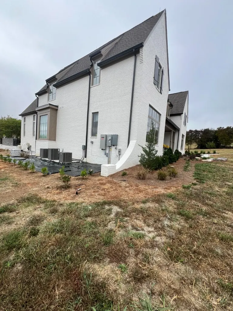 Before landscape bed cleanup & brown mulch in College Grove, TN, MRX Landscaping
