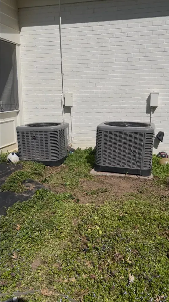 AC units after shrub removal and landscape cleanup in Franklin, Tennessee