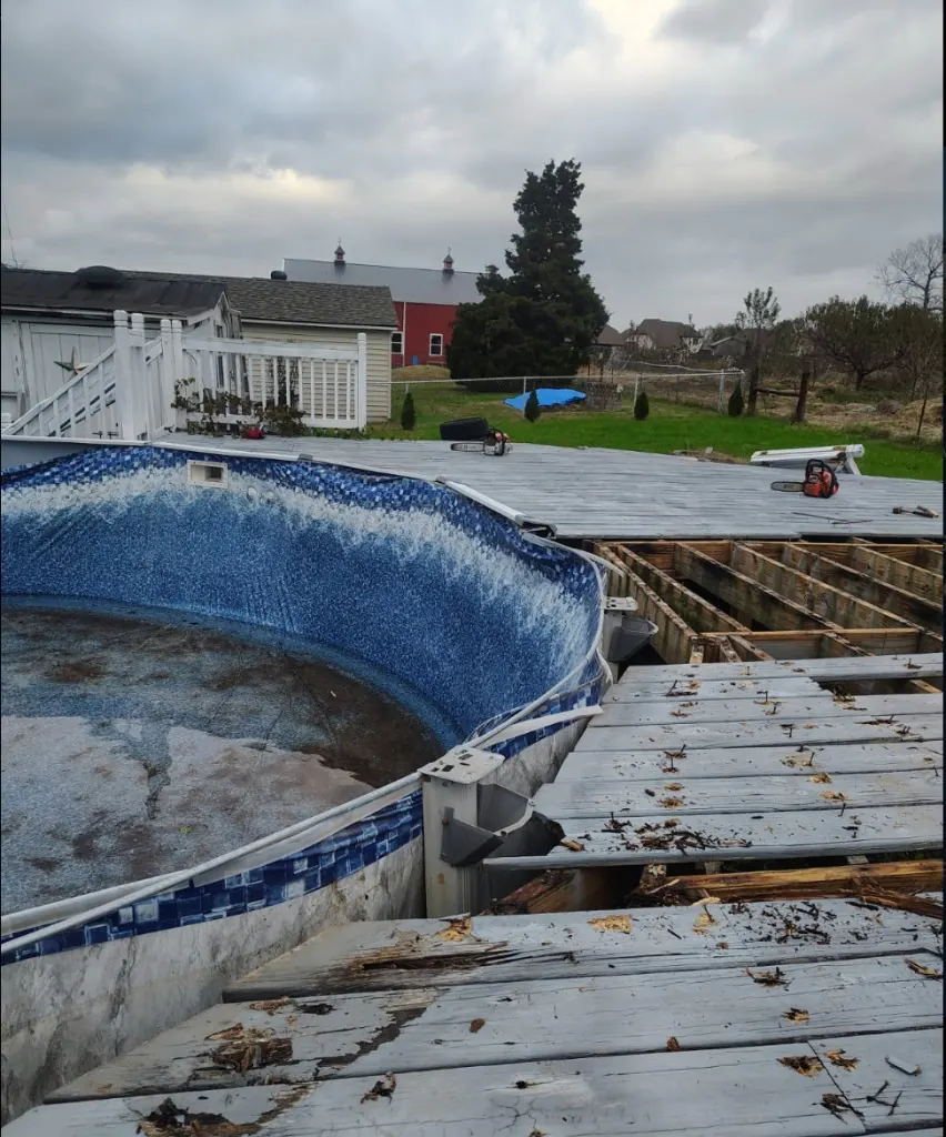 Deck and above-ground pool removal in progress in Spring Hill, TN